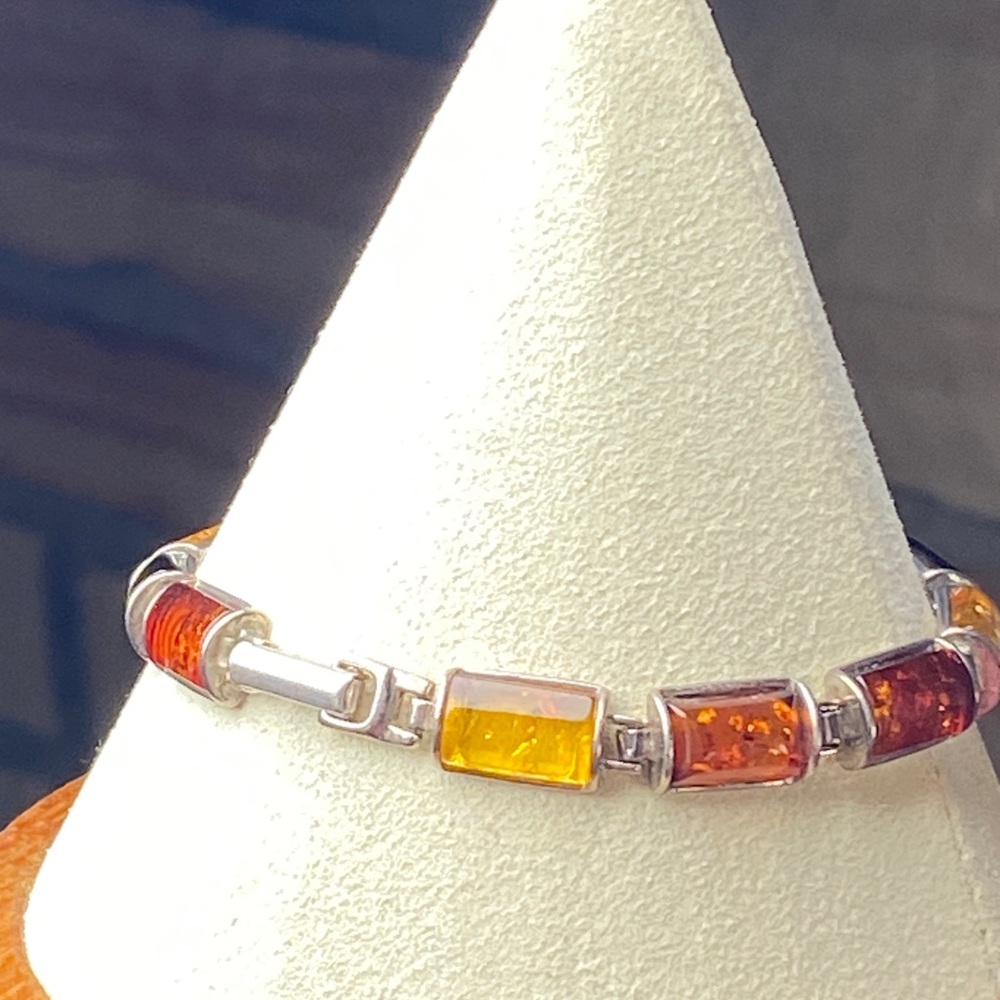 925 SS Amber bracelet with cherry and butterscotch amber, 7.5”long retail $285. - Picture 2 of 6